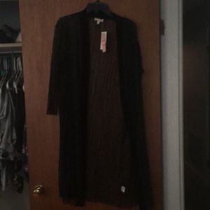Black duster brand new never even tried on